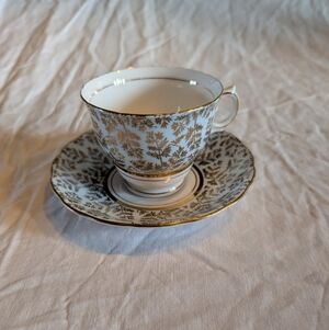 2/30$ Elegant Gold and Blue Tea Cup and Saucer Set